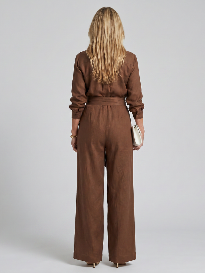 Jovie - Lange Mouw Knop Front Wijde Pijpen Jumpsuit