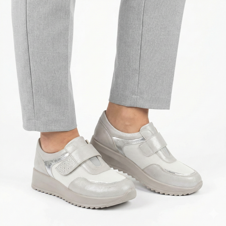 "April - Comfortabele Schoen voor Dames" can be rewritten as "April Comfortabele Schoen voor Dames".